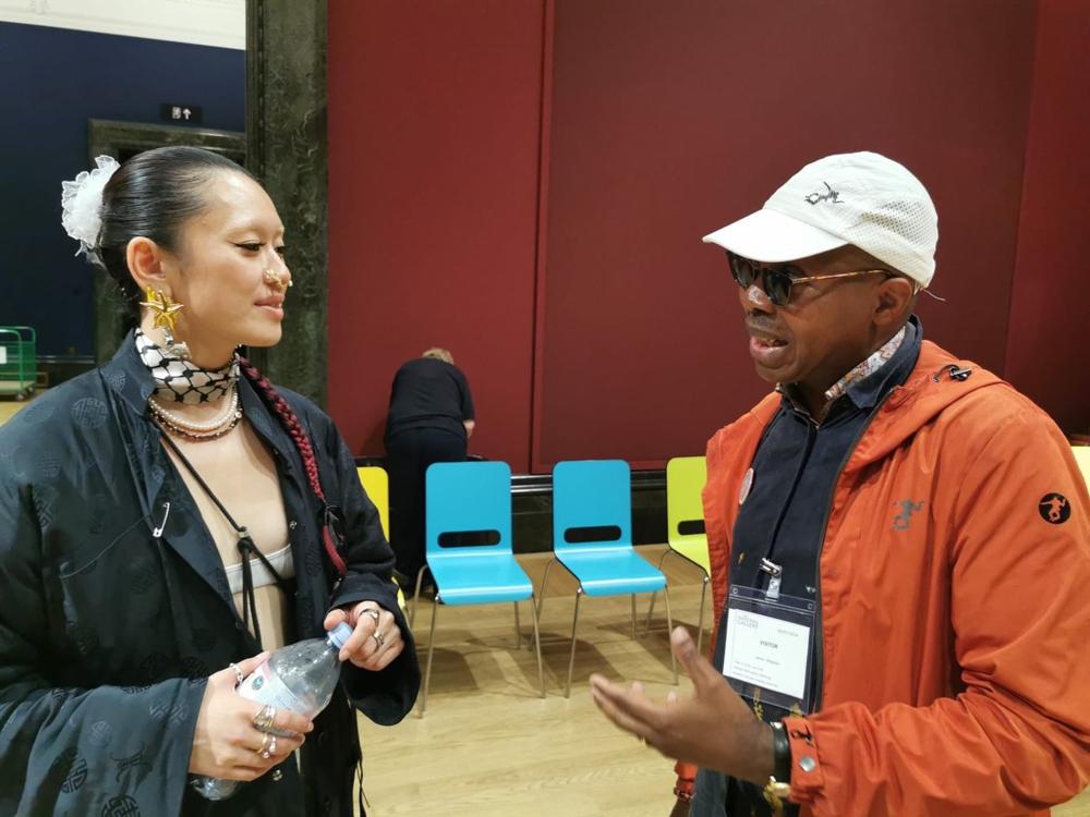 Two guests talking at an Art-Alive event